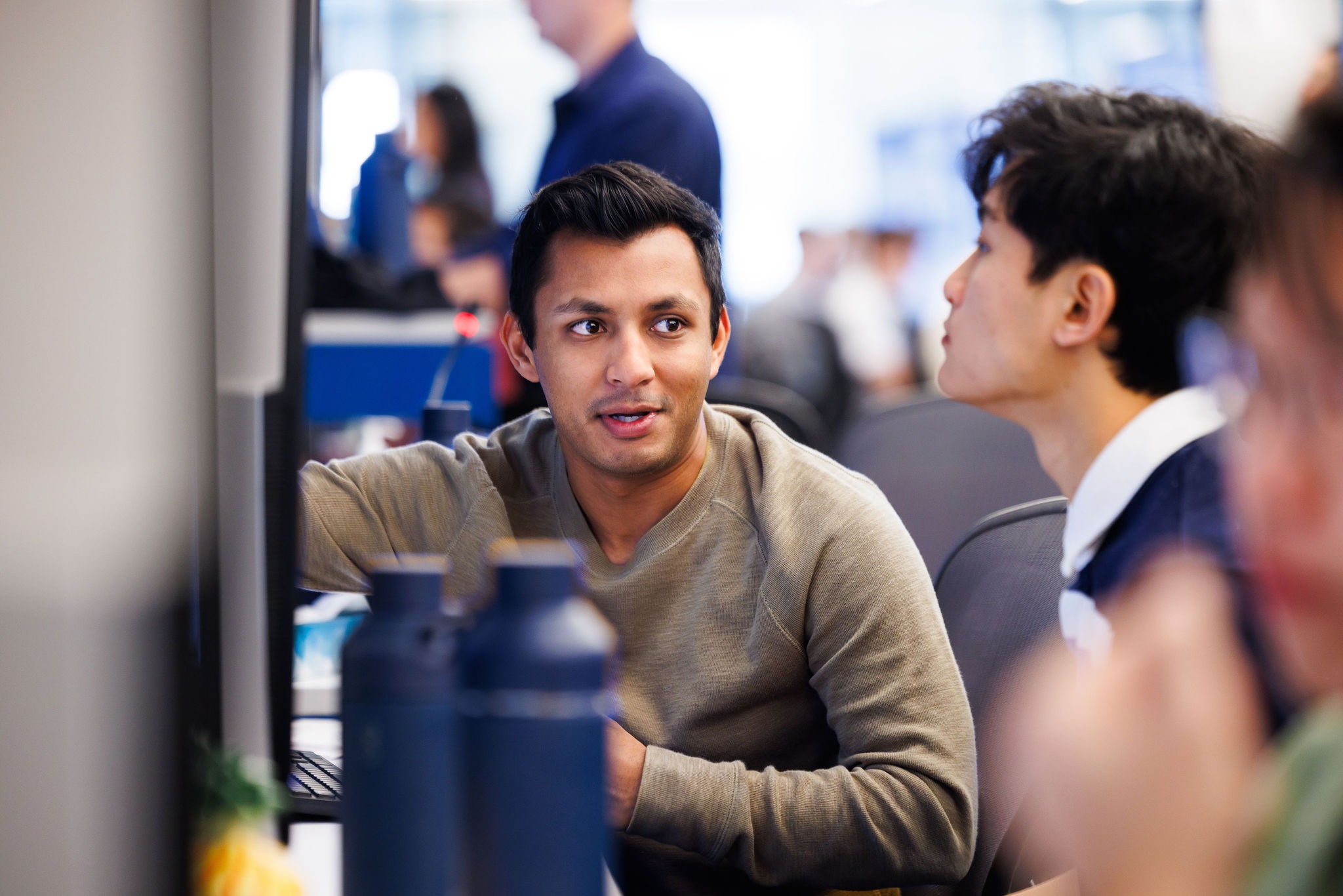 Investment professionals collaborating