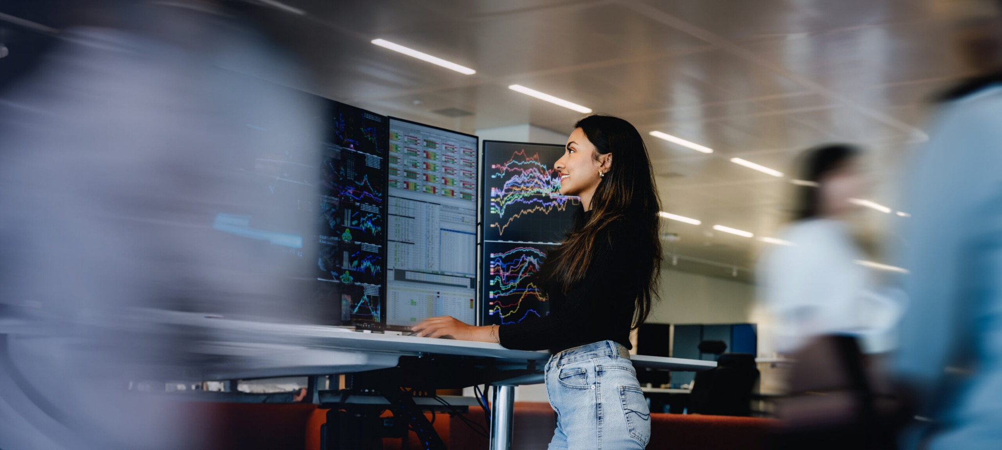 Investment professional reviewing market information