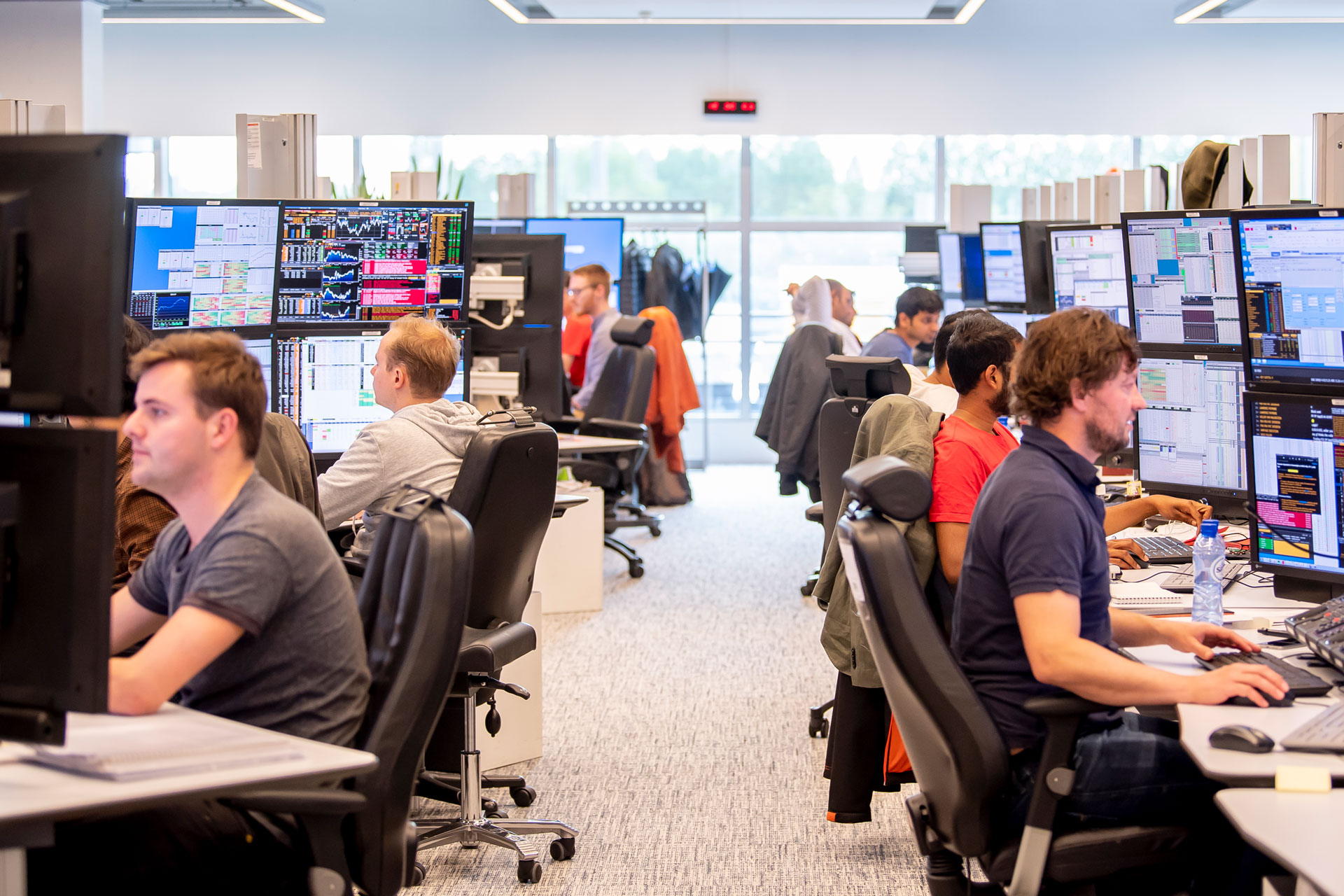 Quassar investment professionals at work