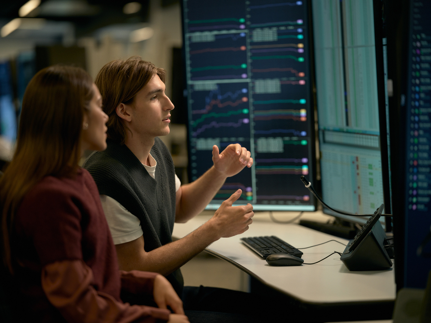 Investment professionals at a workstation